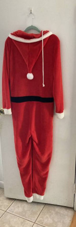 Santa Claus-themed pajama suit ... adults/kids elf