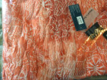 Brand new scarves in sealed bags