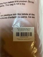 Samara purse, new in packaging