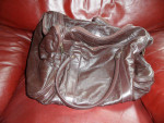 brown leather  expandable carry bag