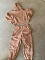 Several trash bags of brand name clothes