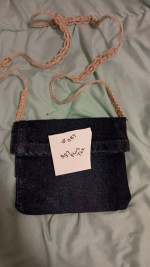 Handsewn demin purses, clutch style handbags, crossbody styles bags, as well as 