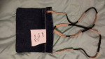 Handsewn demin purses, clutch style handbags, crossbody styles bags, as well as 
