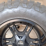 20"x13.5"wheels and 37"Grabber tires for Jeep.
