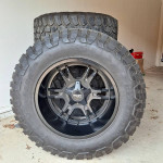 20"x13.5"wheels and 37"Grabber tires for Jeep.