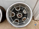Oldsmobile set of rally OEM rims w/ 2 brand new tires!