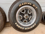 Oldsmobile set of rally OEM rims w/ 2 brand new tires!