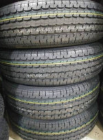 4 NEW 8 LUG TRAILER RIMS AND ST235/80R16 -10 ply radial tires