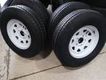 4 New ST205/75R15 heavy duty Tires on 5LUG - 5.0 BOLT PATTERN