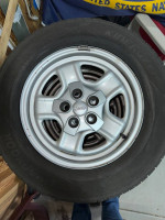 Hankook 205/70/r16 tires on Jeep Patriot rims with center caps 98%