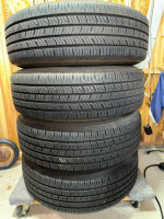 Hankook 205/70/r16 tires on Jeep Patriot rims with center caps 98%
