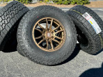17” bronze 6x5.5 rims Falken AT4w A/T tires wheels Toyota Chevy 33”
