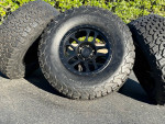 17x9 black Ford F-150 Raptor rims 6x135 6 lug wheels 35” BFG A/T tires