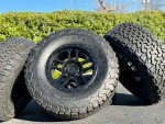 17x9 black Ford F-150 Raptor rims 6x135 6 lug wheels 35” BFG A/T tires
