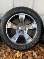20” Dodge ram 1500 (3) original rims and like new tires and (1) spare