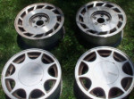 Nissan Maxima factory alloy rims. 15" w/ center caps, 89-94, two pairs
