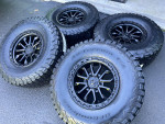(4) NEW 17X9 TIS OFF-ROAD BLACK WHEELS AND NEW TIRES 35X12.50X17