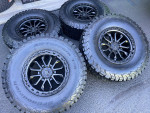 (4) NEW 17X9 TIS OFF-ROAD BLACK WHEELS AND NEW TIRES 35X12.50X17