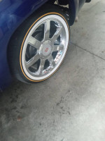 285/45/22 Vouge Tires with Cadillac Escalade Wheels and center caps