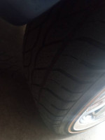 285/45/22 Vouge Tires with Cadillac Escalade Wheels and center caps