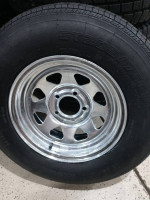 2 Galvanized 14" rims and st205/75/14 Trailer tires