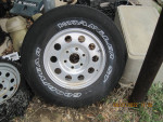 One 6 lug aluminum 16" rim with tire