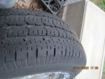 One 6 lug aluminum 16" rim with tire