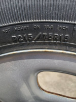 two tires one JEEP wheel. P215/75R16