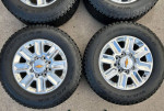 Almost new 8 lug 20 inch Chevy wheels and tires