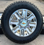 Almost new 8 lug 20 inch Chevy wheels and tires