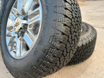 Almost new 8 lug 20 inch Chevy wheels and tires