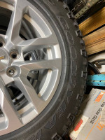 brand new 275-65R18 goodyears on oem chevy rims