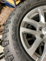 brand new 275-65R18 goodyears on oem chevy rims