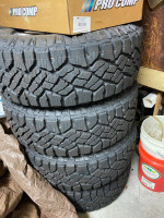 brand new 275-65R18 goodyears on oem chevy rims