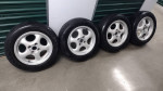 14 inch wheels 4x100 with tires and center caps
