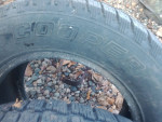 2 matching cooper tires