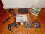 PlayStation 2 slim console, 11 games, controller, cables, memory