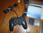 PlayStation 2 slim console, 11 games, controller, cables, memory