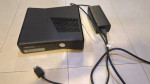 Microsoft Xbox 360 S 4GB Model 1439 (CONSOLE AND POWER WIRE ONLY)