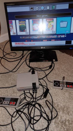 Nintendo Nes mini with over 1000 games and 2 extended controllers