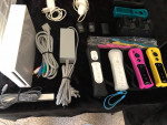 WHITE Wii SYSTEM WITH MANY ACCESSORIES