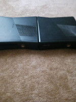 2 xbox 360 slim.consoles