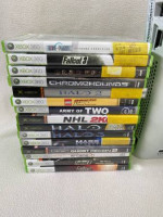 2011 original XBOX 360 console with cords and 17 games