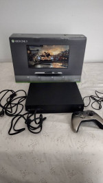 Xbox ONE X 1TB console and 1 controller