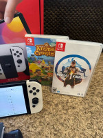 Nintendo switch 0LED with two games.
