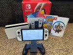 Nintendo switch 0LED with two games.