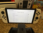 Nintendo switch 0LED with two games.