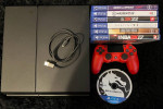 Playstation 4 with 7 games excellent condition